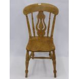 A Vintage Pine Kitchen Chair, with lyre back and turned legs.