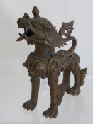 An Antique Tibetan Bronze Dog of Fo Censer, approx 21 cms.