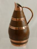 An Antique Oak and Copper Banded Ale Ewer, approx 32 cms.