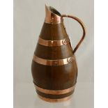 An Antique Oak and Copper Banded Ale Ewer, approx 32 cms.