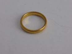 A 22 ct Yellow Gold Wedding Ring, mm WW Ltd., size P, approx wt 5.3 gms.