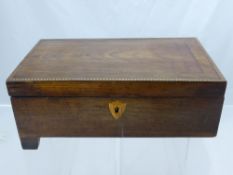 A 19th Century Rosewood Stationery Box, with decorative inlay to the top, brass lion mask carry