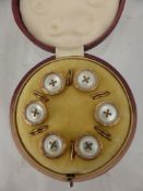 A Set of Gentleman's Dress Studs, with mother of pearl, in the original box.