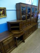 Two Ercol Glass Fronted Display Cabinets, having two cupboards beneath and two central cupboards