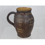 A Late 19th Century Doulton & Slaters Patent 'Leather Jack' Tavern Jug, embossed with a rhyme
