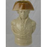 A Staffordshire Stoneware Character Jug, of Admiral Nelson with brown glazed hat over quarter length