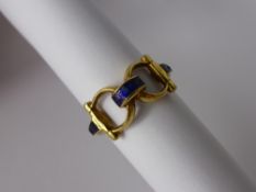 A Lady's 18 ct Yellow Gold and Enamel Stirrup Ring.