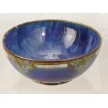 A Doulton Lambeth Ware Fruit Bowl, with blue glazed and fruit decoration, impressed marks to base,