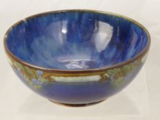 A Doulton Lambeth Ware Fruit Bowl, with blue glazed and fruit decoration, impressed marks to base,