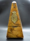A 19th Century Walnut Metronome de Maelzel, with the original key, with brass plaque.