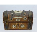 An Antique Leather and Mother of Pearl Perfume Casket, with three cut glass perfume bottles.