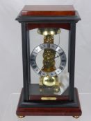 Franz Hermle "Rapport" Reproduction Skeleton Clock in glass ebonised case, approx 33 x 20 cms.