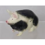 A Small Wemyss Black and White Pottery Pig Money Box, the pig having some black markings and