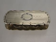 A Solid Silver Vinaigrette, the vinaigrette having scalloped edges with engraved top and filigree