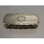 A Solid Silver Vinaigrette, the vinaigrette having scalloped edges with engraved top and filigree