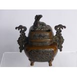 Japanese Meiji Period Bronze Koro and Cover, with stylized carp handles and mythological creature