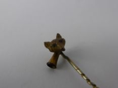 A 9 Ct Gold Fox Head Stock Pin, the stock pin having red stone eyes, mm J.P.H.
