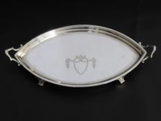 A Solid Silver Almond Shape Card Tray, the tray having unengraved shield cartouche with handles,