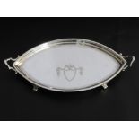 A Solid Silver Almond Shape Card Tray, the tray having unengraved shield cartouche with handles,