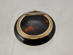 A 9 ct Gold Mounted Tortoise Shell Miniature Compact with chain loop to top, approx 5 cms long.