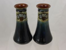 A Pair of Royal Doulton Lambeth Ware Vases, mottled green glaze with decorative floral collar,