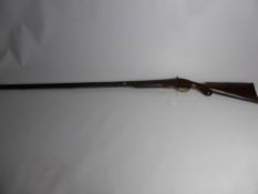 A 16 Bore Muzzle Loading Sporting Rifle, 36" Barrel, walnut stock with semi-pistol grip. Engraved