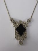 A Lady's Art Deco 18 Ct White Gold and Platinum Cluster Pendant, the pendant set with diamond form