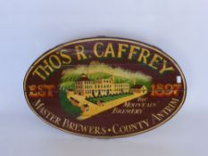 An Oval Timber Advertising Sign for Thos R Caffrey, Master Brewers, County Antrim, approx 92 x 60
