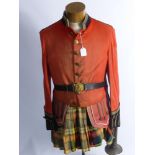 A Mannequin with Part Scottish Drummer's Jacket, together with naval officer's gilt belt and buckle,