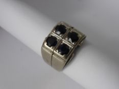 A Gentleman's 14 Ct White Gold and Sapphire Ring size L, 4 x 4.3 mm sapphires, approx wt 9 gms.