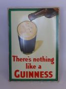 An Enamel Advertising Board for Guinness, which reads "There's Nothing Like a Guinness", approx 50 x