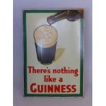 An Enamel Advertising Board for Guinness, which reads "There's Nothing Like a Guinness", approx 50 x