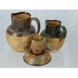 Two Doulton Lambeth Ware Pottery Jugs, including a Poole & Anderson 'Old Scotch Whisky' Jug approx