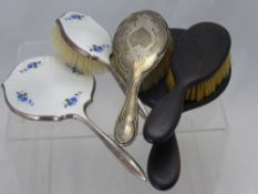 A Miscellaneous Collection of Antique Hairbrushes, including one silver, two enamel, together with
