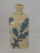 A 19th Century Doulton Lambeth Stone Ware Brandy Decanter, with blue glazed berries, approx 20 cms