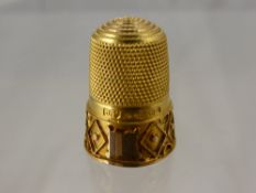 A Lady's 15 Ct Gold Hallmark Thimble, Birmingham hallmark dd 1916, mm J.F.