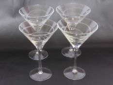Four Martini Glasses with ribbon etched design.