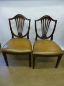 A Set of Six Leather Seated Mahogany Style Shield Back Dining Chairs. (6)