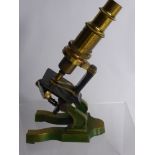 A Vintage Brass Turret Form Microscope.