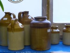 A Quantity of Vintage Pottery Flagon's, of local interest together with three preserving jars.