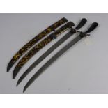 Two Antique Persian Style Short Swords, the swords having horn hilts with curved blades and