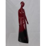 A Royal Doulton Flambe Figurine of a young woman, approx 32 cms high. (af)