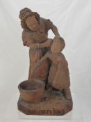 An Antique Black Forest Wooden Carving, the advertising sculpture entitled 'You Dirty Boy' signed