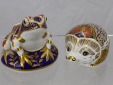 A Pair of Royal Crown Derby Paper Weights in the form of a Frog and a (Hawthorne)Hedgehog.
