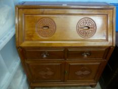 A Chinese Cherry Wood Drop Front Desk, the desk having Chinese symbols to front, two drawers