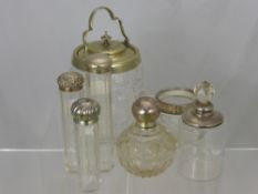 Three Cut Glass and Silver Topped Dressing Table Jars, together with two silver topped perfume