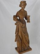 A Black Forest Style Carved Wooden Figure of a Lady, signed A.O. Zwink, Ober-Ammergau dd September