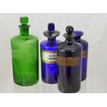 A Quantity of Coloured Glass Chemists Jars, some with stoppers, including two Cobalt Blue & Amethyst