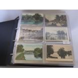 An Album of Approximately 200 Black/White and Coloured Victorian Post Cards, depicting scenes of