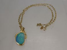 A 14 Ct Yellow Gold and Opal Pendant, mm RAM, on 9 ct gold chain, total wt 8 gms.